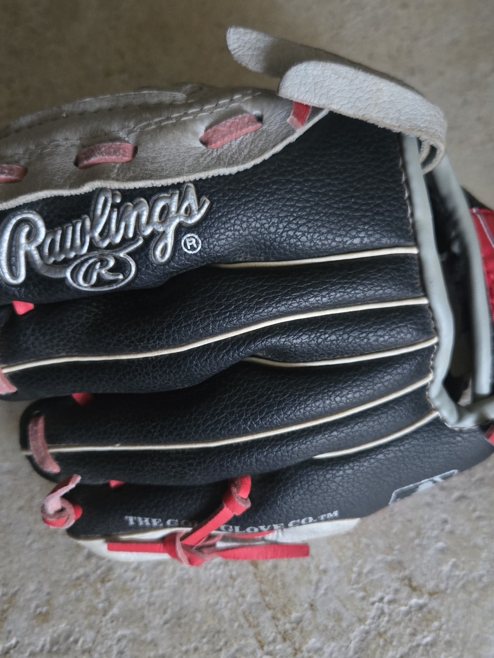 Rawlings Black and White Baseball Glove with Red Accents
